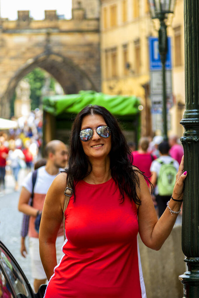 Beautiful woman on street of Prague, Czech - Фото, изображение