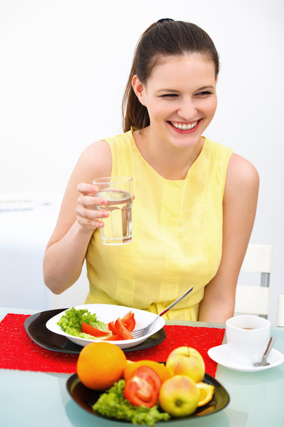 Woman Eating healthy food - Fotó, kép