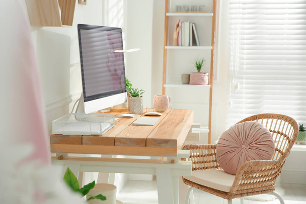 Stylish home office interior with comfortable workplace - Foto, imagen