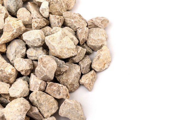 Gray small rocks ground texture isolated on white background. Small road stone. Gravel pebbles stone. crushed granite gravel, close up.  - Photo, Image
