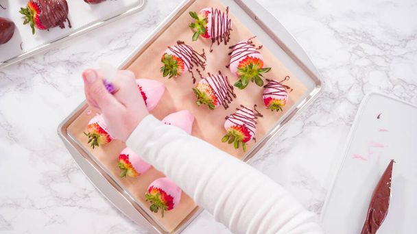 Flat lay. Step by step. Garnishing chocolate dipped strawberries with drizzled chocolate. - Photo, Image