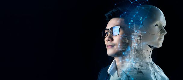 mladý asijský muž v brýlích s robotem a hologramem - Fotografie, Obrázek
