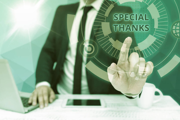 Hand writing sign Special Thanks. Conceptual photo appreciating something or someone in a most unique way Bussiness Man Sitting Desk Laptop And Phone Pointing Futuristic Technology. - Photo, Image