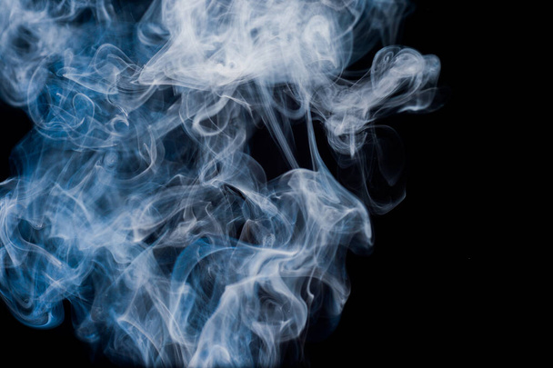 smoke moving background abstract pattern background on a black background - Foto, afbeelding