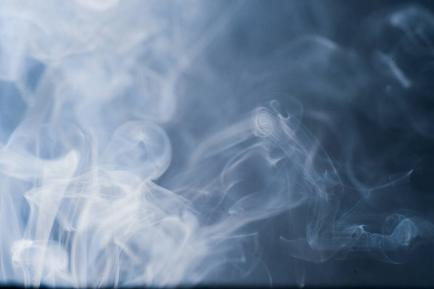 καπνός κινούμενο φόντο αφηρημένο μοτίβο φόντο σε μαύρο φόντο - Φωτογραφία, εικόνα