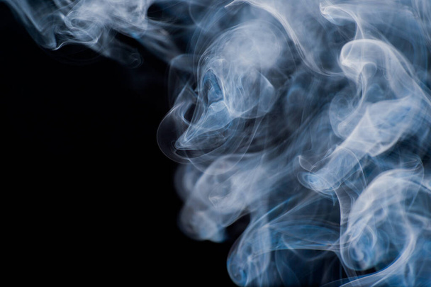 smoke moving background abstract pattern background on a black background - Foto, Imagem