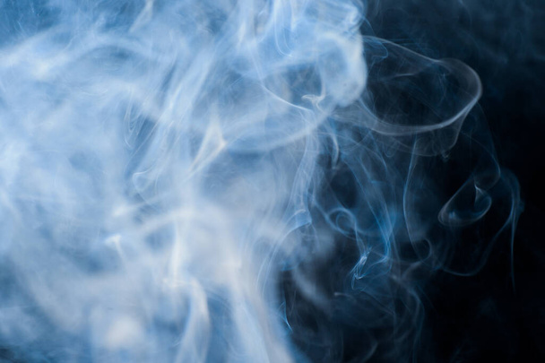 καπνός κινούμενο φόντο αφηρημένο μοτίβο φόντο σε μαύρο φόντο - Φωτογραφία, εικόνα