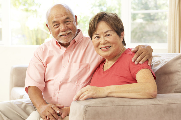 Senior Couple Relaxing At Home Together - Photo, image