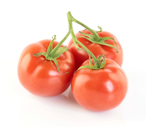 Ripe red tomatoes on white background. - Fotografie, Obrázek