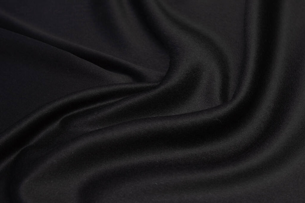 Textur aus schwarzem Wollstoff mit Vignette - Foto, Bild