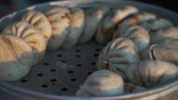 Baozi with meat filling. Street food. - Footage, Video