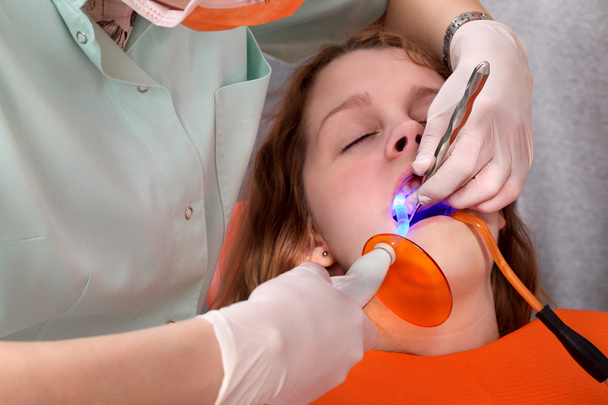 Dental procedure, led laser - Photo, image