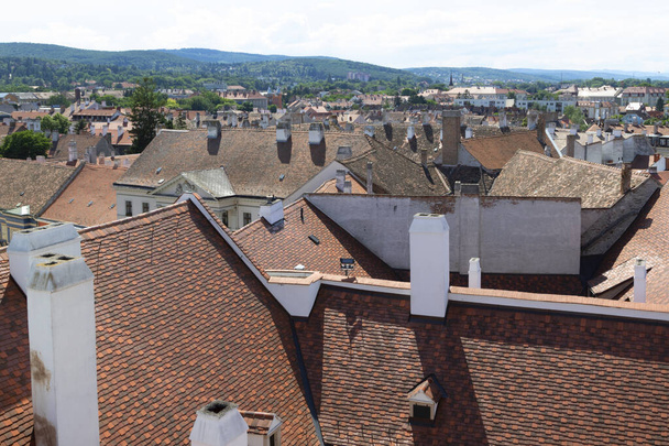 Sopron Hungary Jun 2 2018: Red roofs of the old town of Sopron seen from the Fire watch tower. Hungary. Sopron skyline. - Фото, зображення