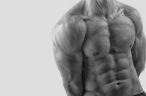 Close-up op perfecte abs. sterke bodybuilder met zes pack - Foto, afbeelding