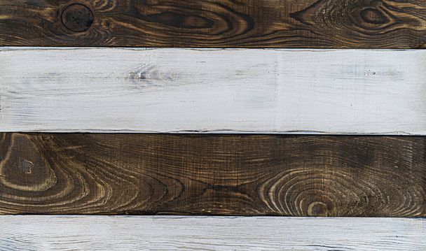 Striped wood background of light white wood and dark brown wood - Foto, Imagen