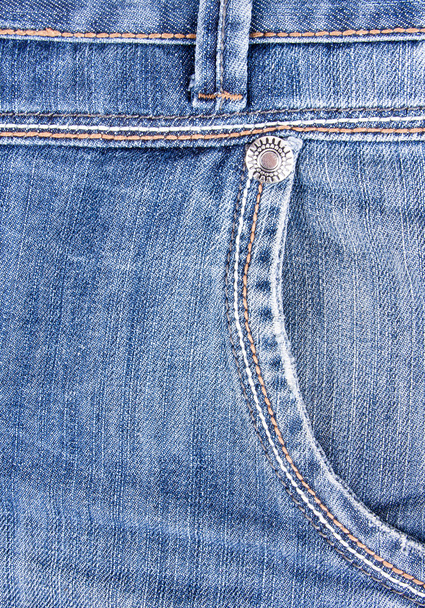 Close-up of blue jeans background with pocket - 写真・画像