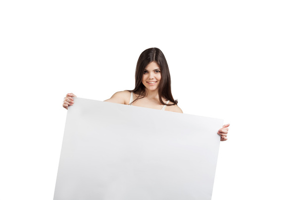 Woman holding a blank billboard - Foto, imagen