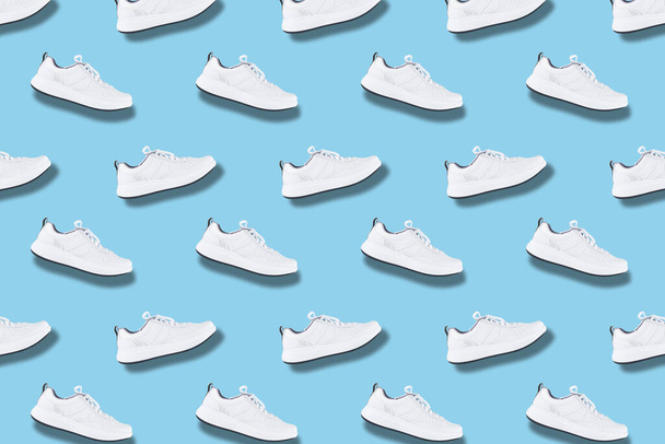 White sneakers seamless pattern on blue background - Фото, зображення