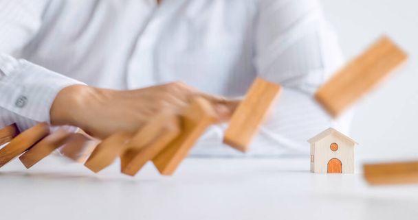 home protection with insurance concept with wooden home model and wooden blocks - Φωτογραφία, εικόνα