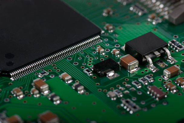 Macro view of electronic circuit board - Фото, изображение