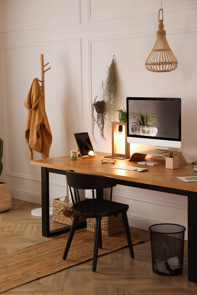 Modern workplace with computer in room. Interior design - Фото, зображення