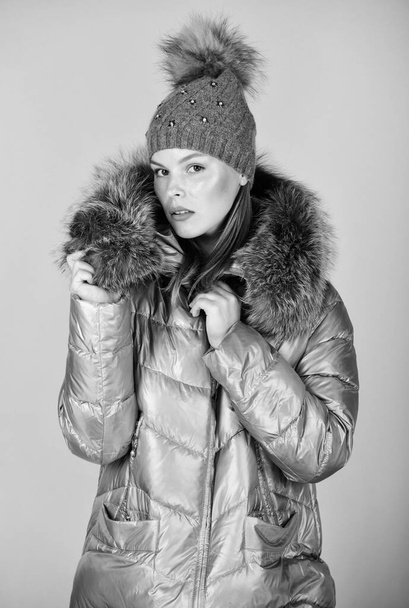 Faux fur. Casual winter jacket slightly more stylish and have more comfort features such as larger hood fur trim on hood. Fashion girl winter clothes. Fashion coat and hat. Fashion trend. Warming up - Foto, imagen