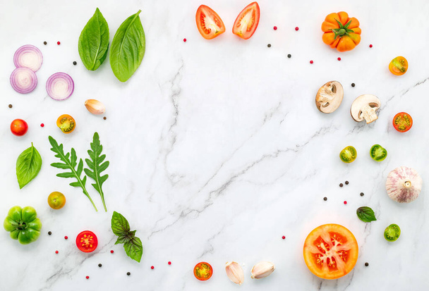 The ingredients for homemade pizza set up on white marble background. - Foto, immagini