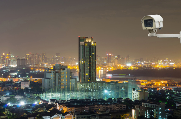 Security camera monitoring the Bangkok cityscape at twilight, wo - Photo, Image