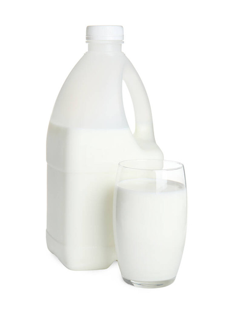 Gallon bottle and glass of milk on white background - Photo, image