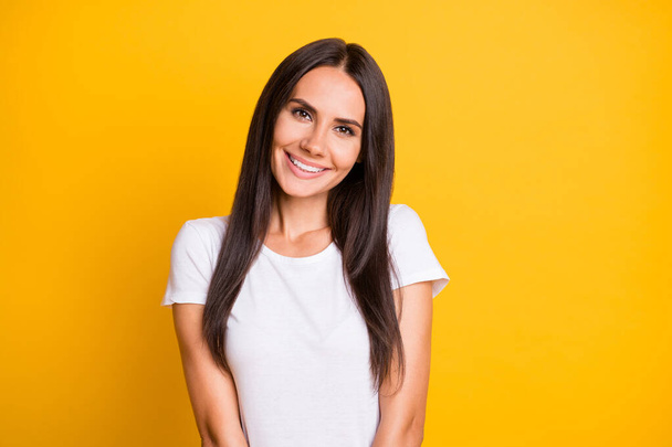 Photo portrait of cute brunette smiling isolated on bright yellow color background - Foto, Imagem
