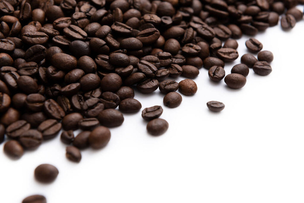Coffee beans group on white background side view - Foto, imagen
