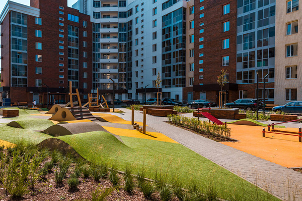 The courtyard of a modern residential building with equipments for workout and fitness outdoor activities. - Photo, Image