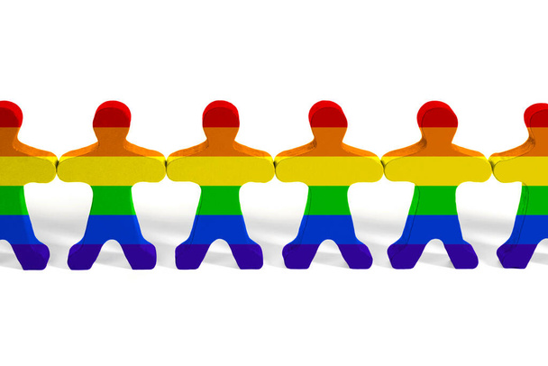 Дерев'яні іграшки людей в LGBT райдужних кольорах. Права ЛГБТ. Рівність прав. Права людини і терпимість. - Фото, зображення