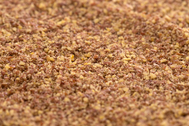 Un arrière-plan de graines de lin au sol - Photo, image