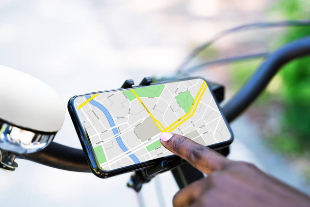 Bicycle GPS Navigator App With Map On Mobile Phone - Foto, afbeelding
