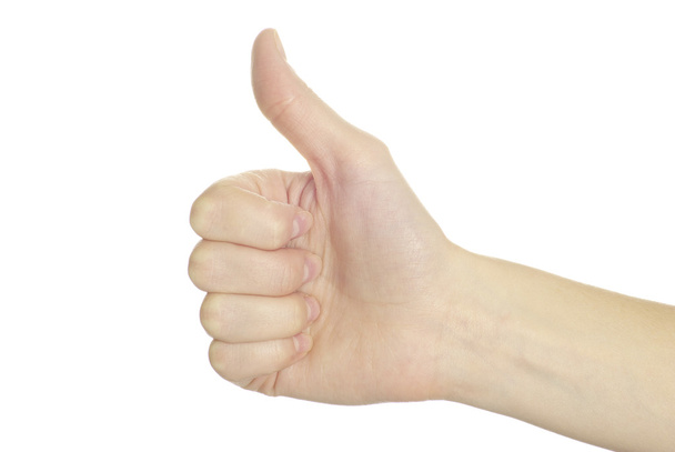 menselijke hand tonen duimschroef opwaarts geïsoleerd op wit - Foto, afbeelding
