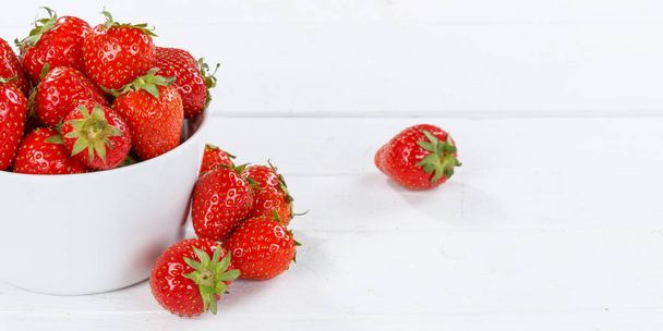 Strawberries berries fruits strawberry berry fruit in a bowl on wooden board panoramic view food - Photo, Image