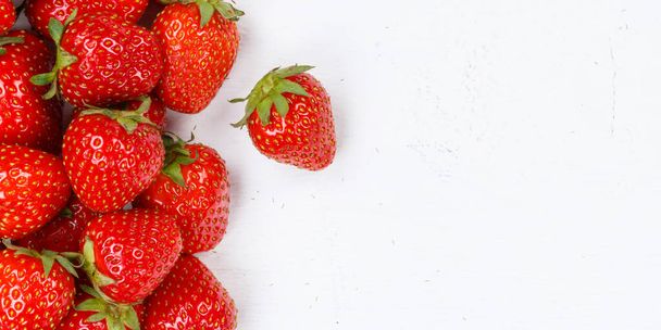 Strawberries berries fruits strawberry berry fruit copyspace copy space on a wooden board panoramic view food - Фото, изображение