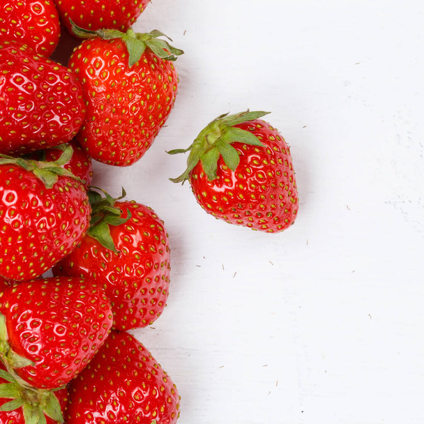 Strawberries berries fruits strawberry berry fruit copyspace copy space on a wooden board square food - Photo, Image