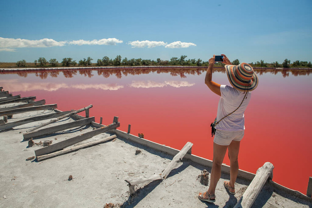 Pink lake located near the Kinburn spit in the Kherson region - Photo, Image