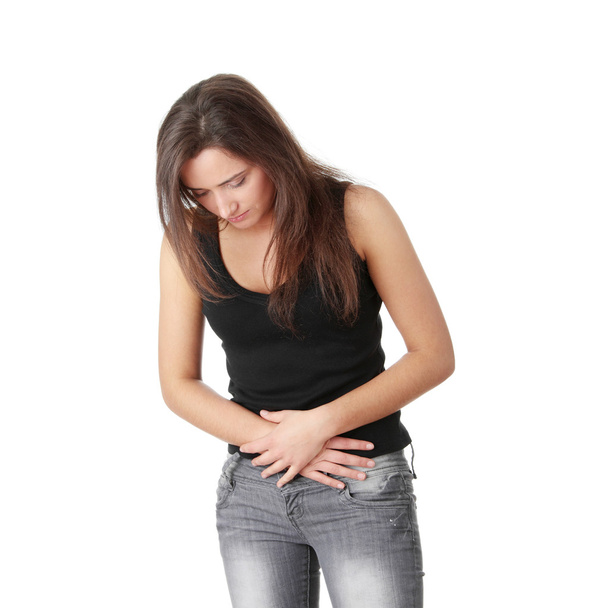 Woman with stomach issues isolated on white background - Φωτογραφία, εικόνα