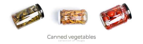 白地に隔離された缶詰の野菜。漬物. - 写真・画像