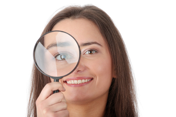 The woman with a magnifier - Foto, imagen