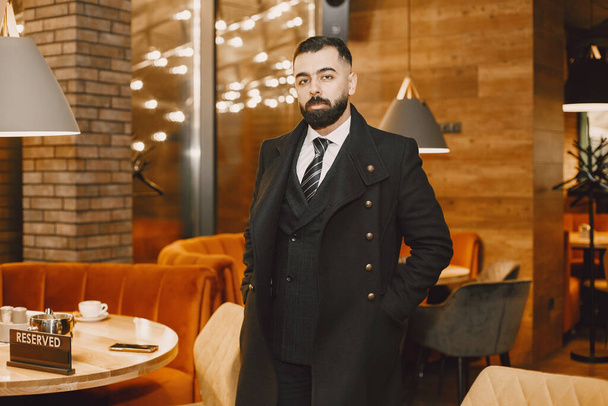 Stylish businessman in a black suit - Fotografie, Obrázek