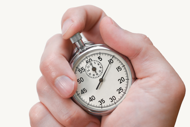 Botón cronómetro presiona el dedo de la mano sobre fondo blanco, aislar. - Foto, imagen