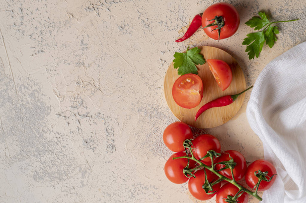 flat lay red fresh organic natural cherry tomatoes on the table, vegan salad ingredientsb - Fotografie, Obrázek