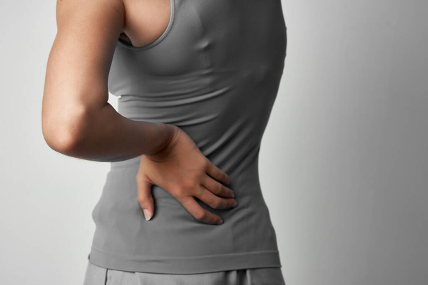 woman with back pain traumatology isolated background medicine - Фото, изображение