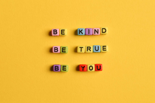 Alphabet letters with text BE KIND, BE TRUE and BE YOU. - Photo, Image