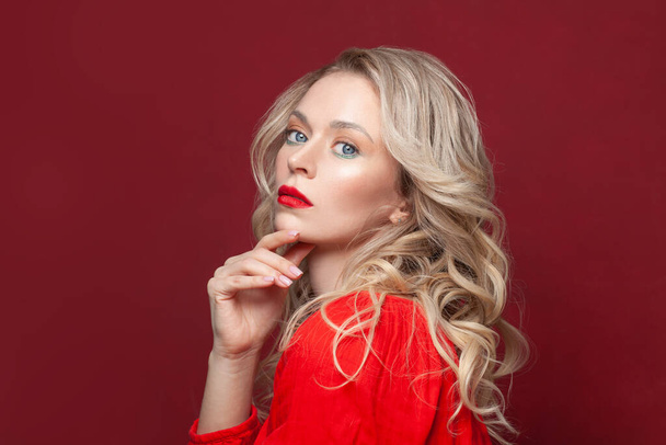 Fashion portrait of stylish woman with perfect makeup. Beautiful model woman with curly hairstyle. Care and beauty, lady in red dress - Photo, Image