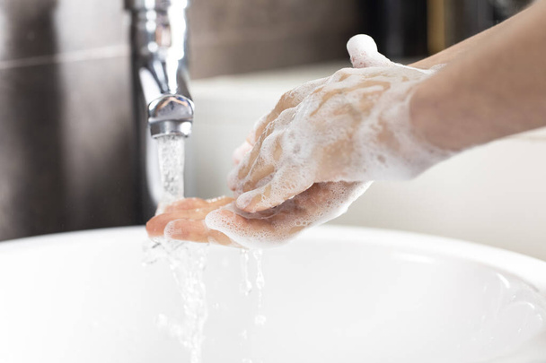 Washing hands rubbing with soap woman for coronavirus prevention - Valokuva, kuva